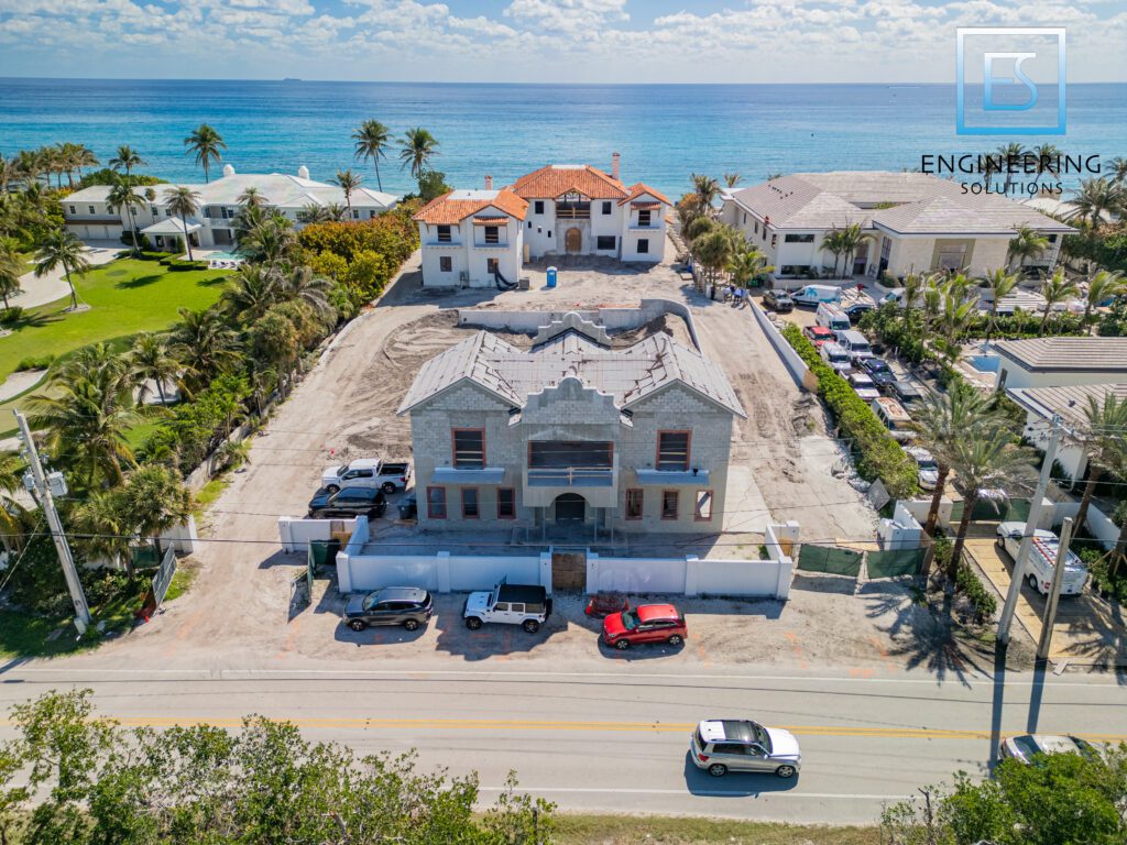 A view of an ocean front building from above.