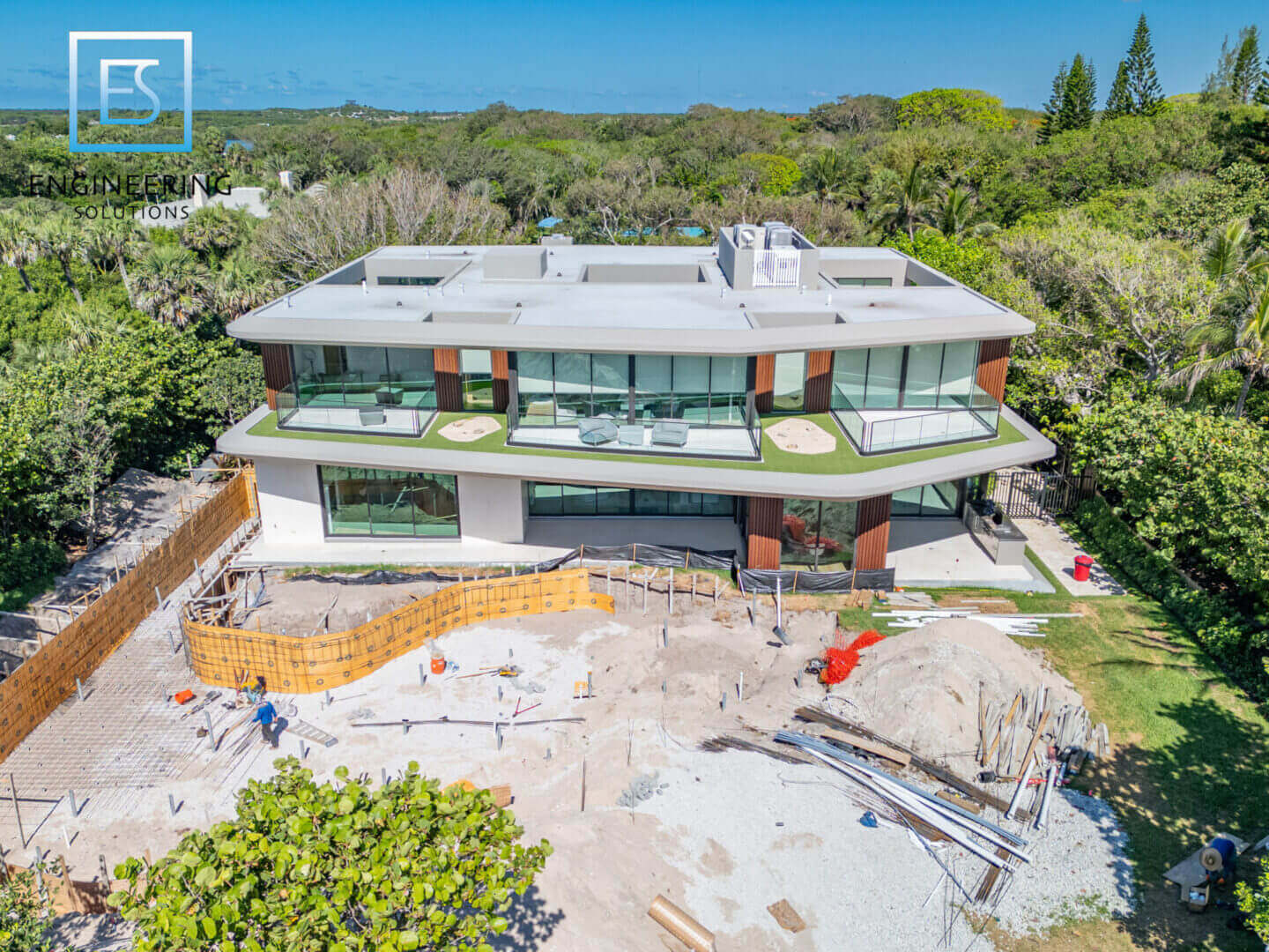 A large house with many windows and doors.