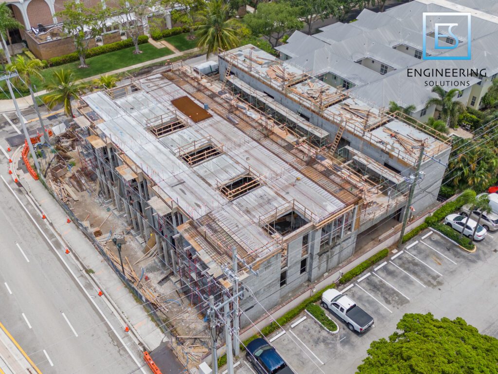 A building under construction with many scaffolding.